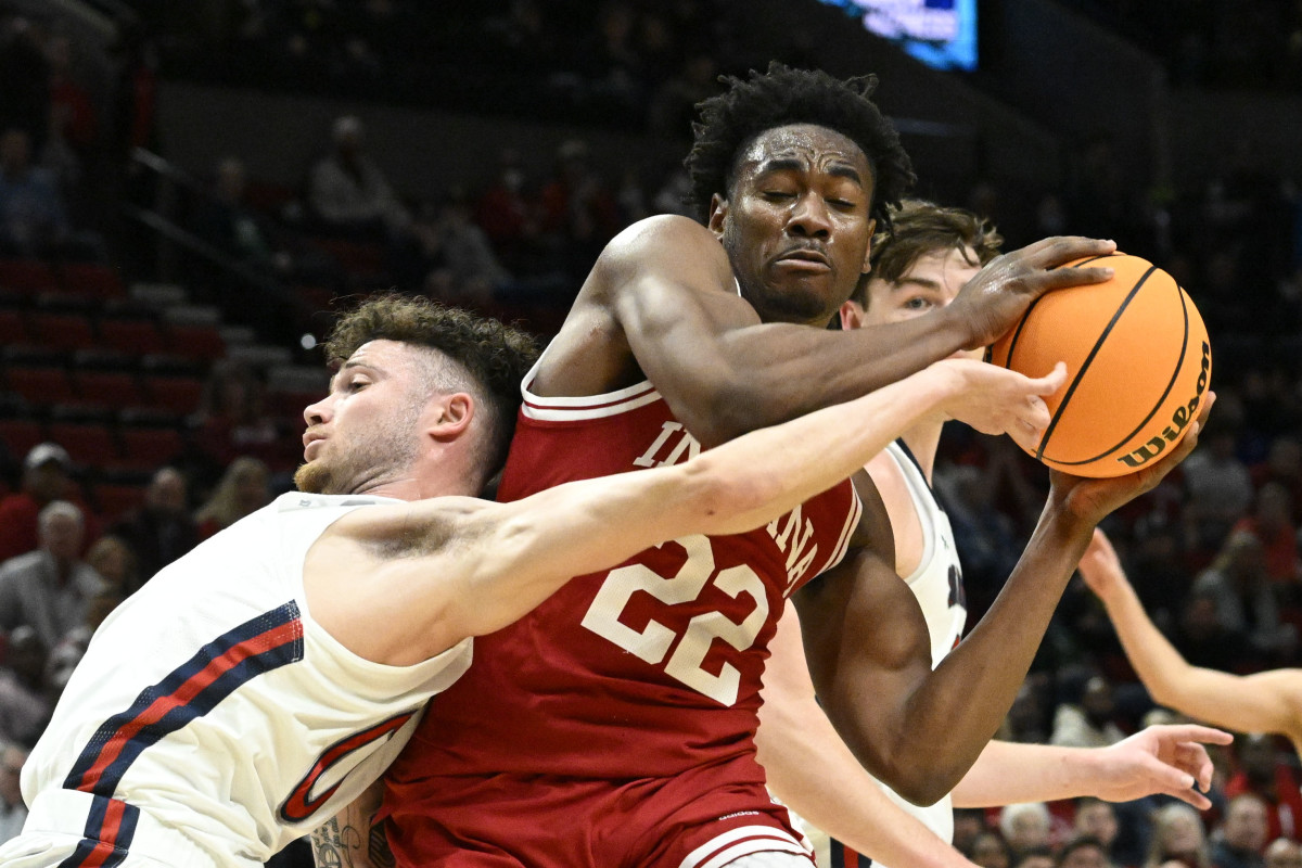 Jordan Geronimo tries to protect the ball from Saint Mary's defenders.