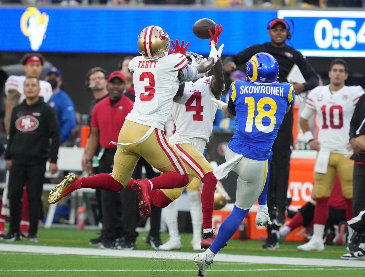 San Francisco 49ers safety Jaquiski Tartt (3) and cornerback Emmanuel Moseley (4) defend a pass intended for Los Angeles Rams wide receiver Ben Skowronek (18). Mandatory Credit: Kirby Lee-USA TODAY Sports