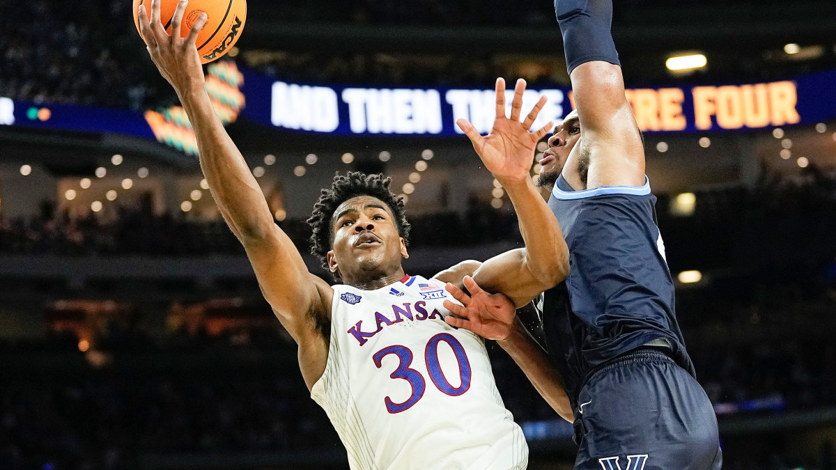Kansas’s Ochai Agbaji goes for a layup