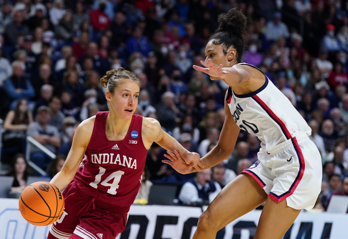 Ali Patberg dribbles past a UConn defender.