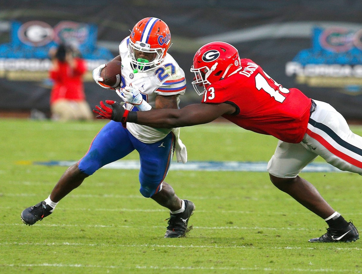 Florida running back Dameon Pierce (27) runs against Georgia. Brad McClenny/The Gainesville Sun via Imagn Content Services, LLC