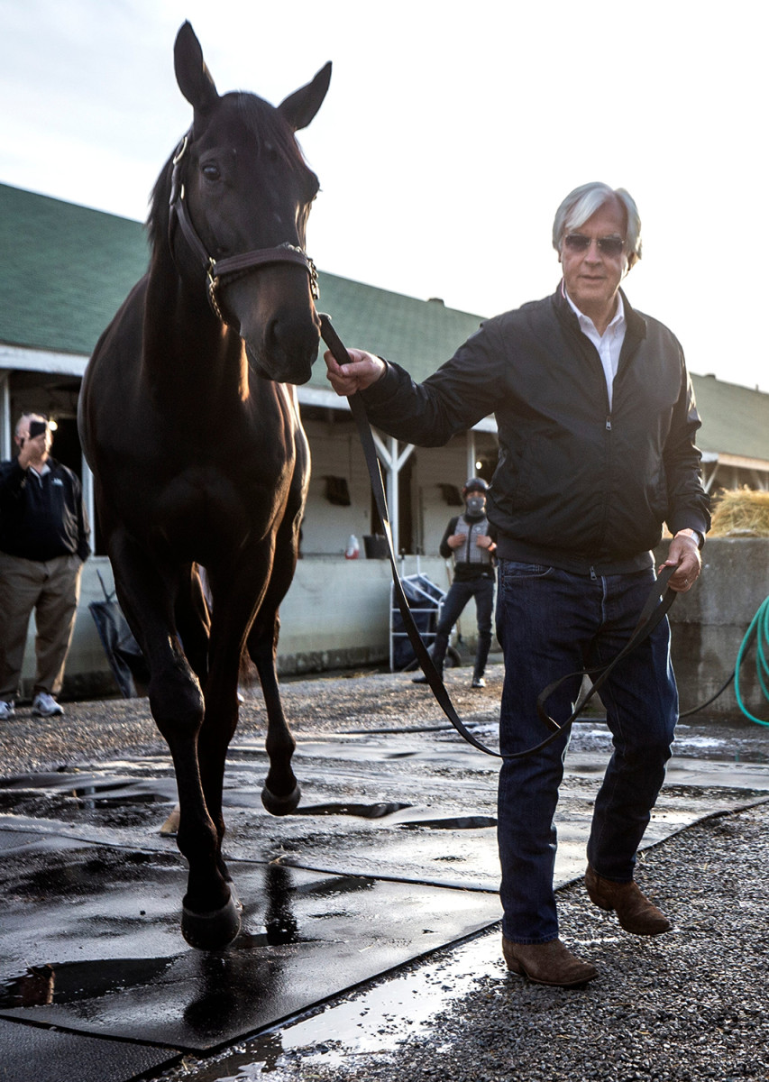 Medina Spirit, pictured here with Baffert in 2021, died later that year. The horse collapsed after a five-furlong workout at Santa Anita Park. 
