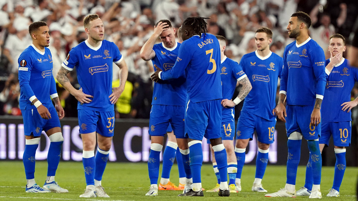 Aaron Ramsey is consoled after missing a penalty for Rangers