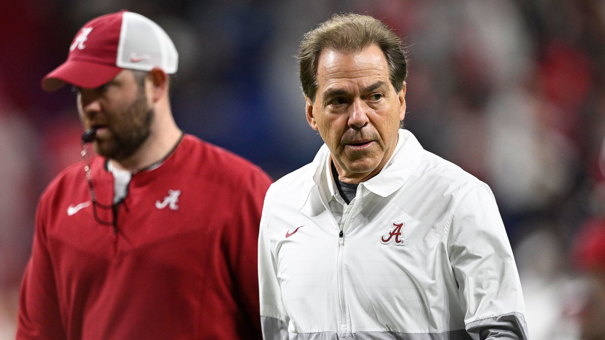 Alabama coach Nick Saban walks on the field