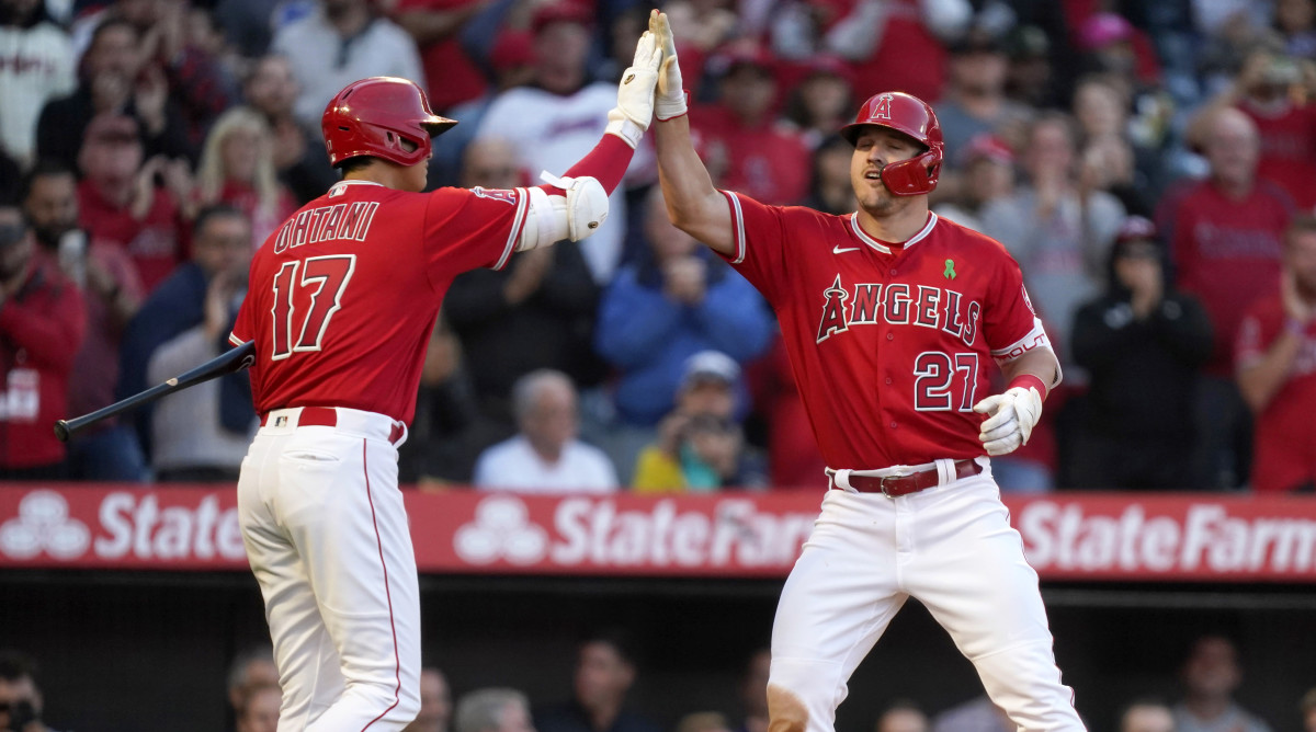 May 10, 2022; Anaheim, California, USA; Los Angeles Angels center fielder Mike Trout (27) celebrates with designated hitter Shohei Ohtani (17) after hitting a home run in the second inning against the Tampa Bay Rays at Angel Stadium.