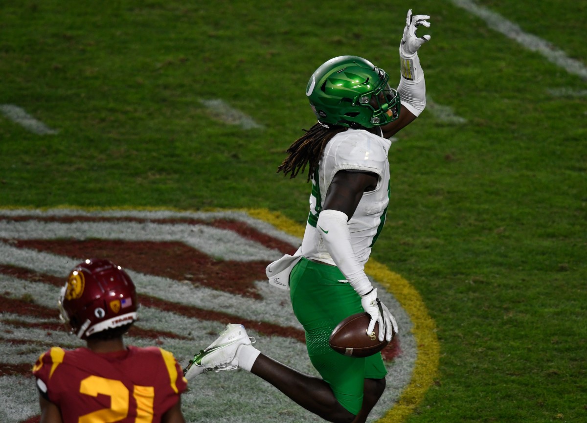 Jamal Hill celebrates one of his two interceptions against USC in the 2020 Pac-12 Championship Game.