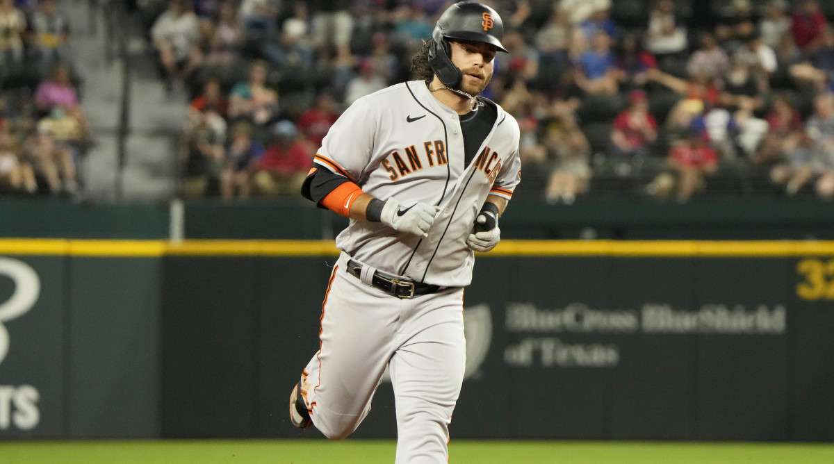 Jun 8, 2021; Arlington, Texas, USA; San Francisco Giants shortstop Brandon Crawford (35) circles the bases on his home run against the Texas Rangers during the sixth inning at Globe Life Field.