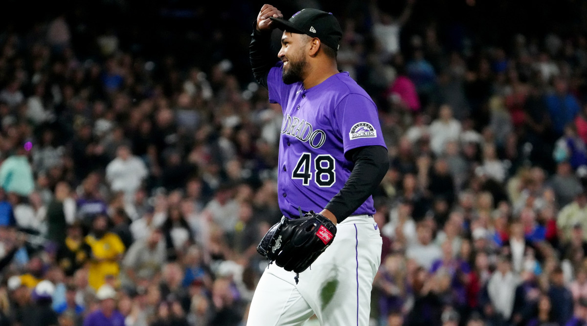 Jun 29, 2021; Denver, Colorado, USA; Colorado Rockies starting pitcher German Marquez (48) celebrates defeating the Pittsburgh Pirates at Coors Field.