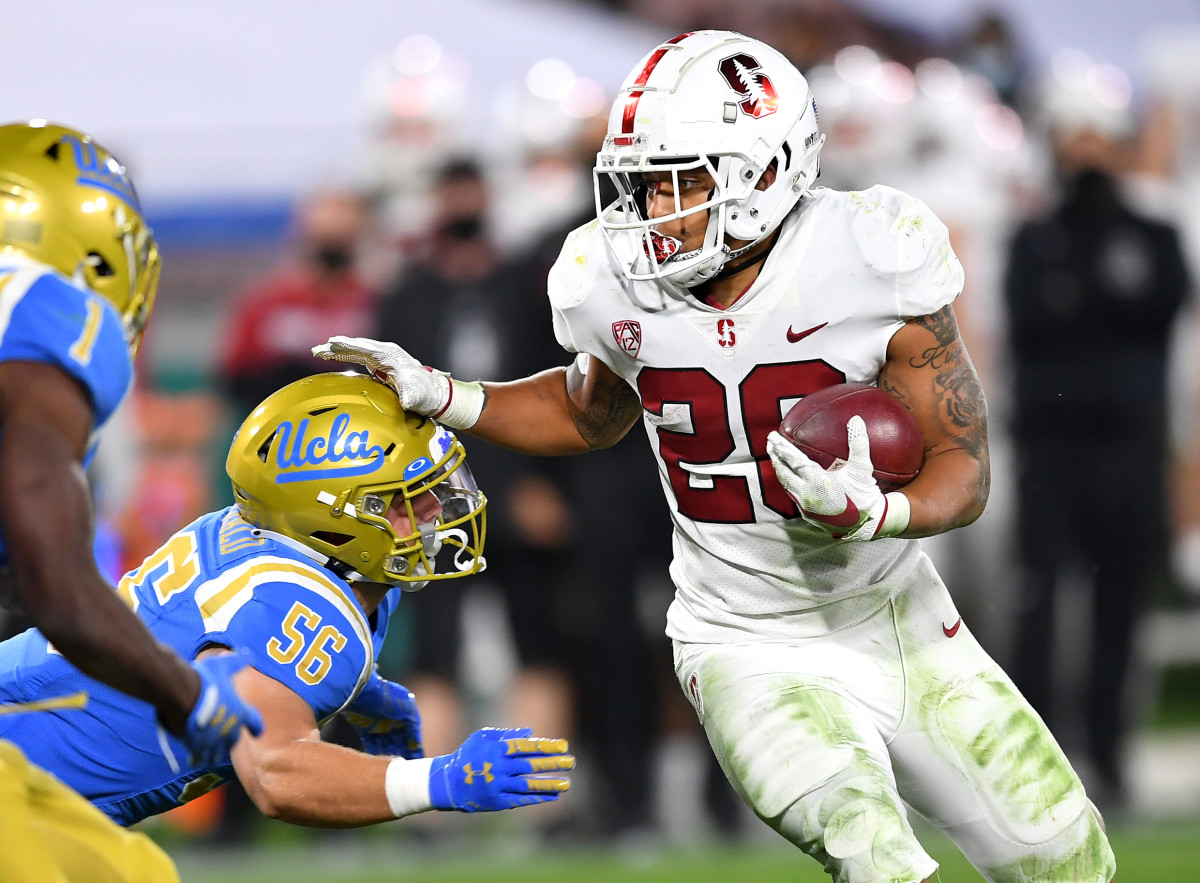 Austin Jones runs the ball against UCLA. 