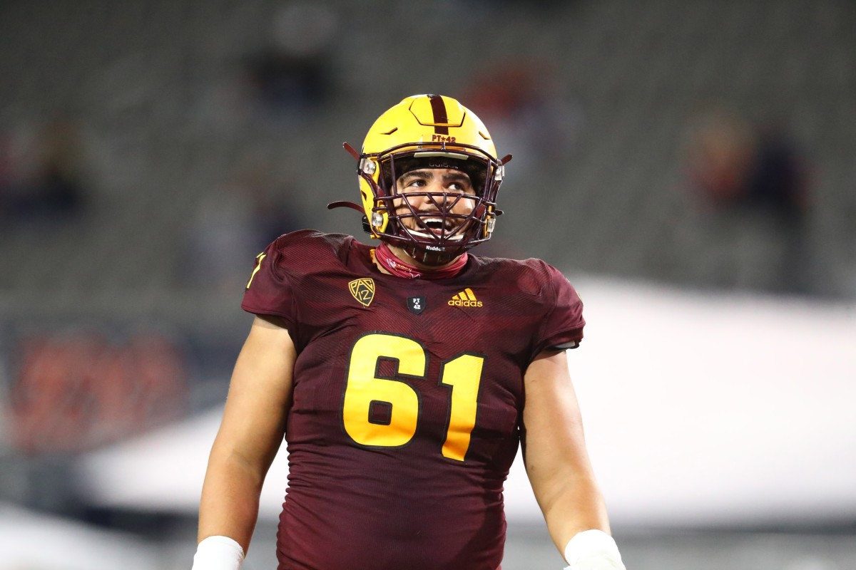 Dec 11, 2020; Tucson, Arizona, USA; Arizona State Sun Devils offensive lineman Dohnovan West (61) against the Arizona Wildcats during the Territorial Cup at Arizona Stadium.