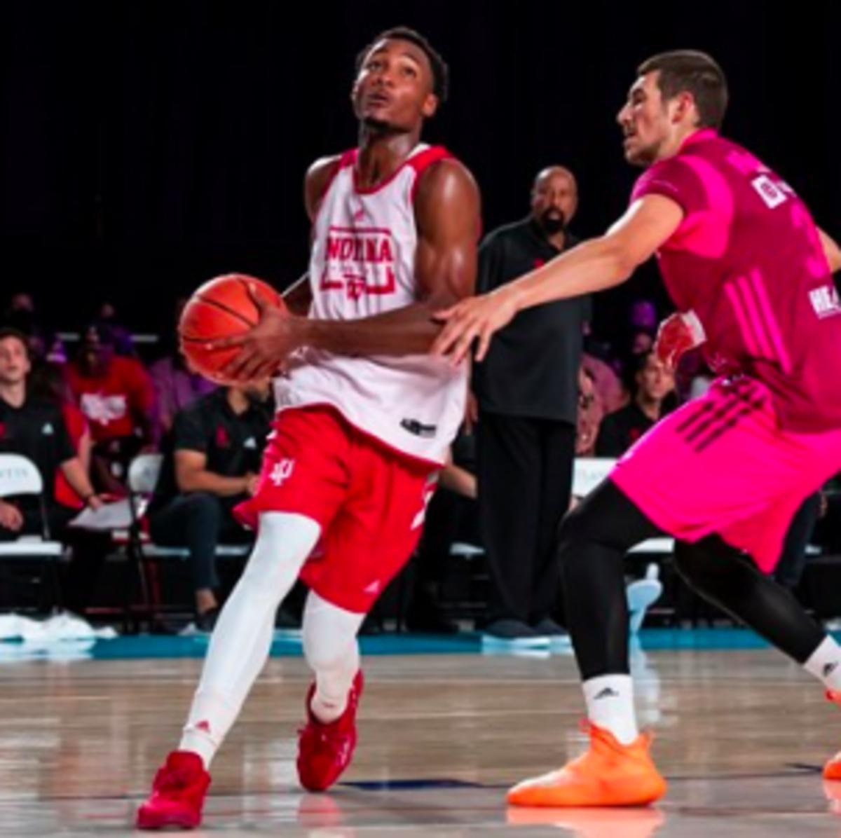 Indiana freshman Tamar Bates drives to the basket during Friday night's 79-66 victory over BC Mega. Bates had 14 points in his first game with the Hoosiers. (Photos courtesy of IU Athletics)