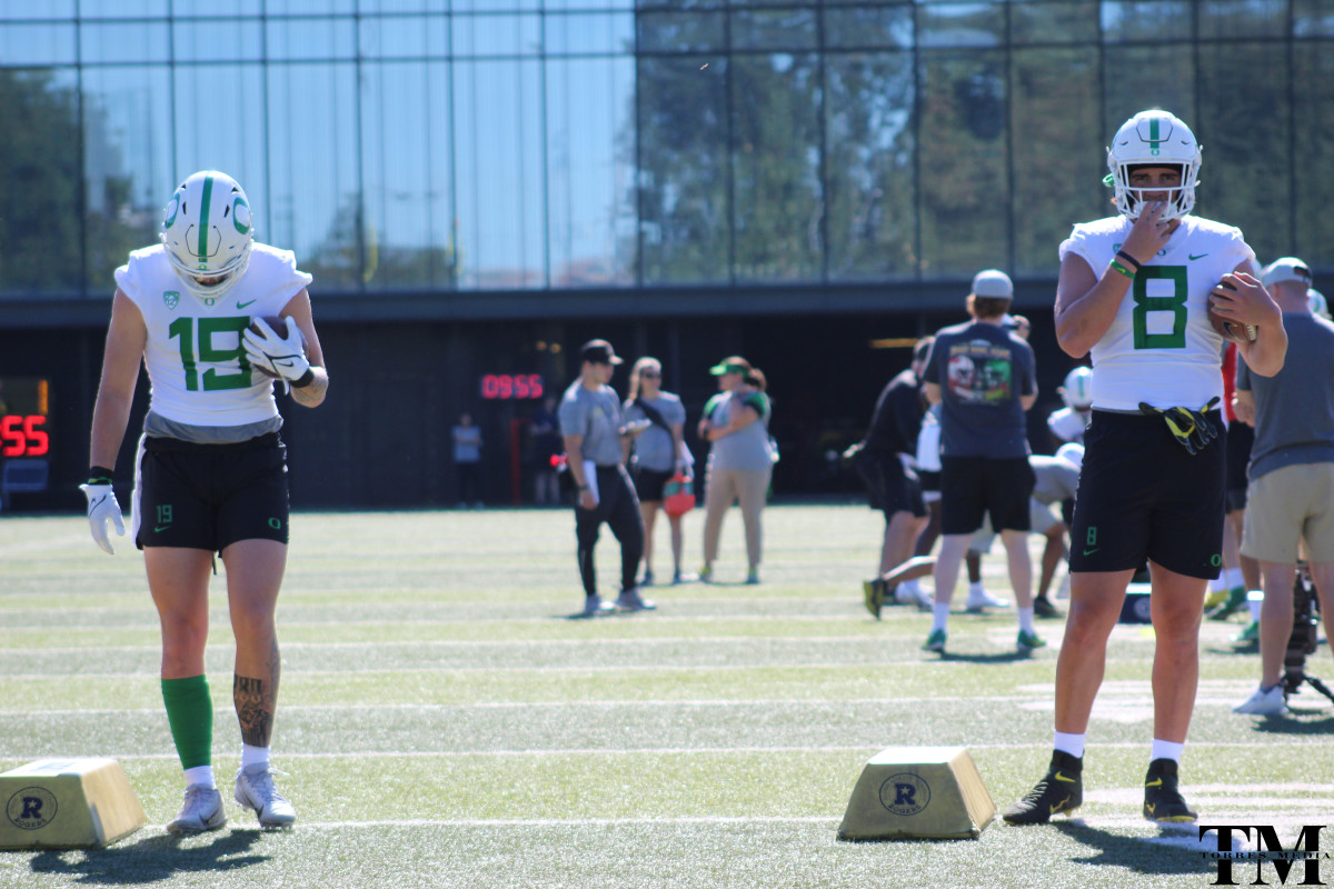 Ferguson and Matavao go through drills during fall camp.