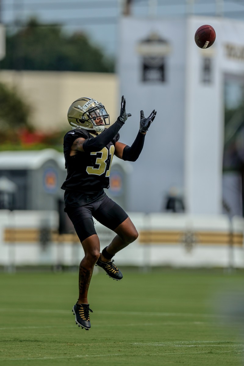 New Orleans Saints cornerback Bryce Thompson (31) performs defensive back drills during a training camp session. Mandatory Credit: Stephen Lew-USA TODAY Sports