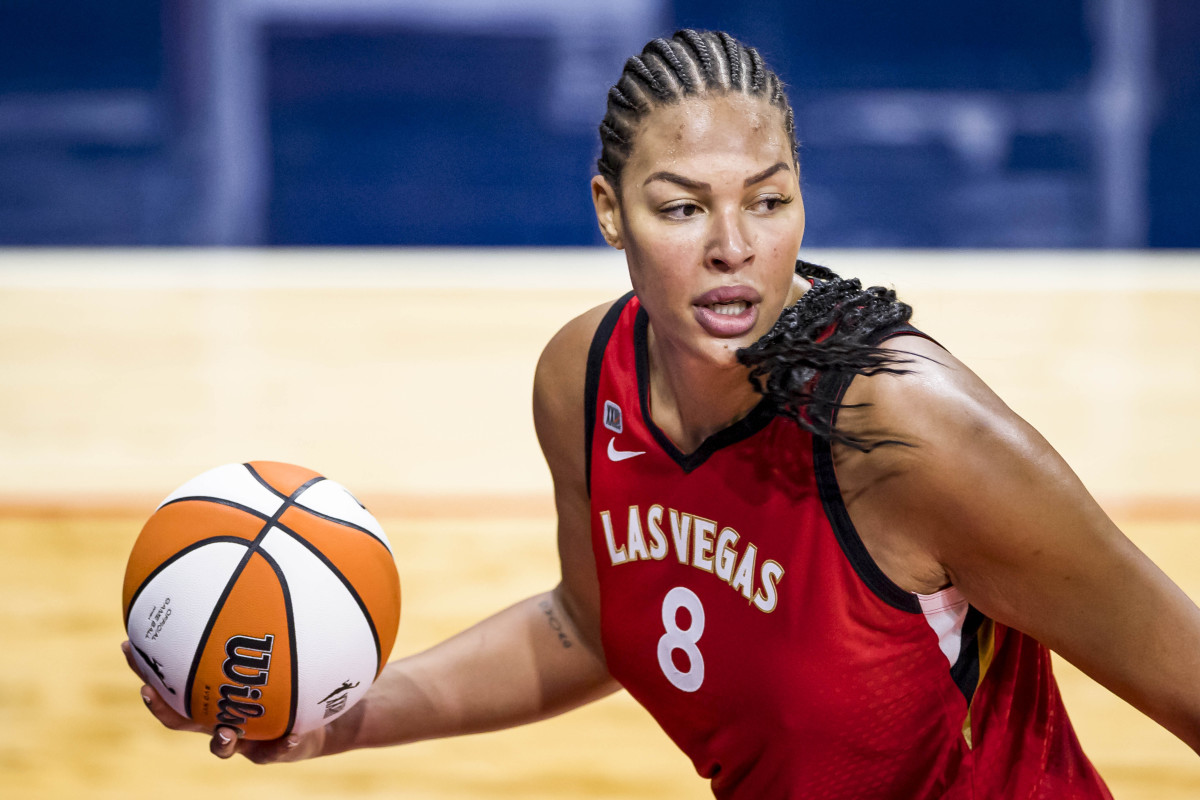 Liz Cambage palms the basketball