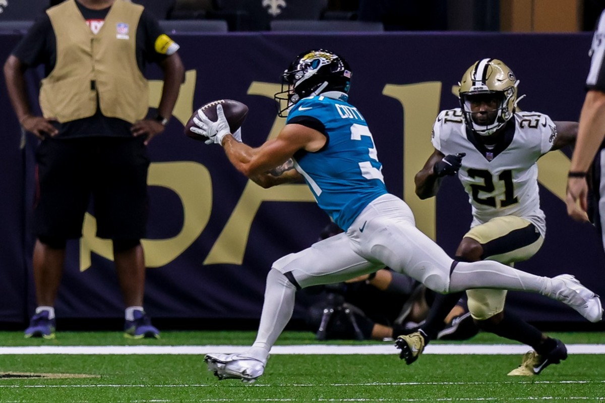 Jacksonville running back Nathan Cottrell (31) converts a two point conversion against New Orleans Saints cornerback Natrell Jamerson (21). Mandatory Credit: Stephen Lew-USA TODAY Sports