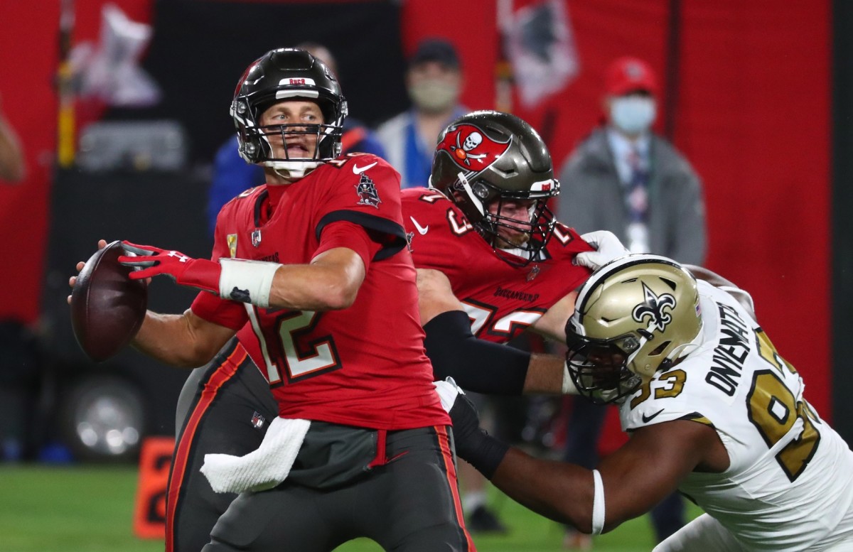 Tampa Bay Buccaneers quarterback Tom Brady (12) throws a pass against the New Orleans Saints. Mandatory Credit: Kim Klement-USA TODAY Sports