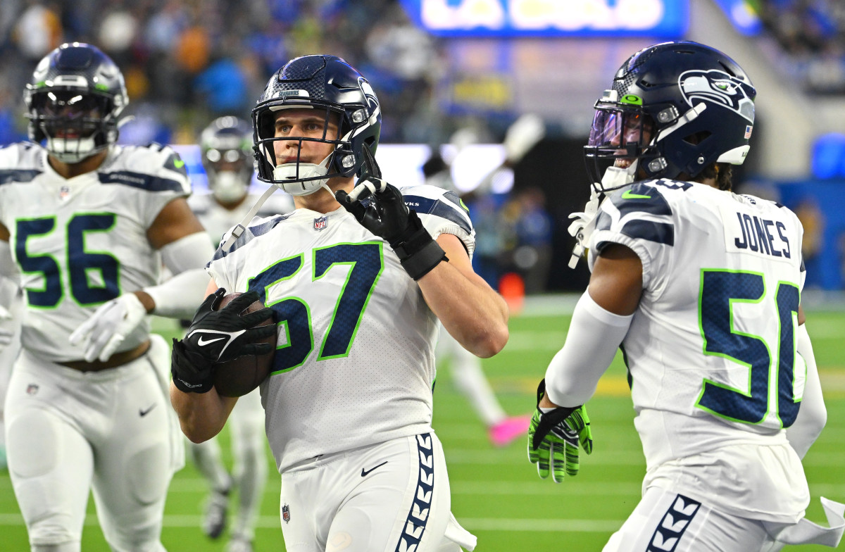 Seattle Seahawks linebacker Cody Barton (57) is celebrates with linebacker Vi Jones (50) after defeating the Los Angeles Rams at SoFi Stadium.