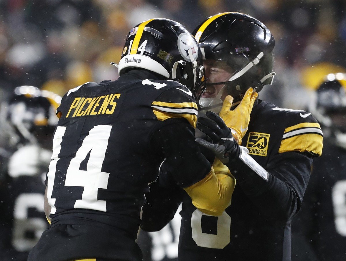 Steelers quarterback Kenny Pickett and receiver George Pickens celebrate their win over the Raiders in Week 16.