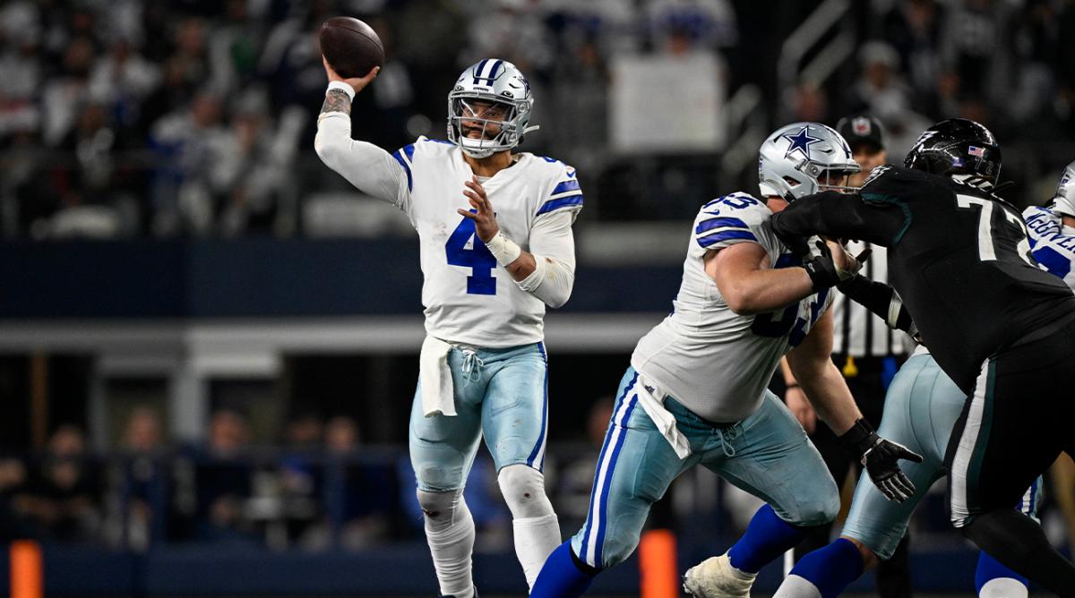 Dec 24, 2022; Arlington, Texas, USA; Dallas Cowboys quarterback Dak Prescott (4) passes against the Dallas Cowboys during the second half at AT&T Stadium.