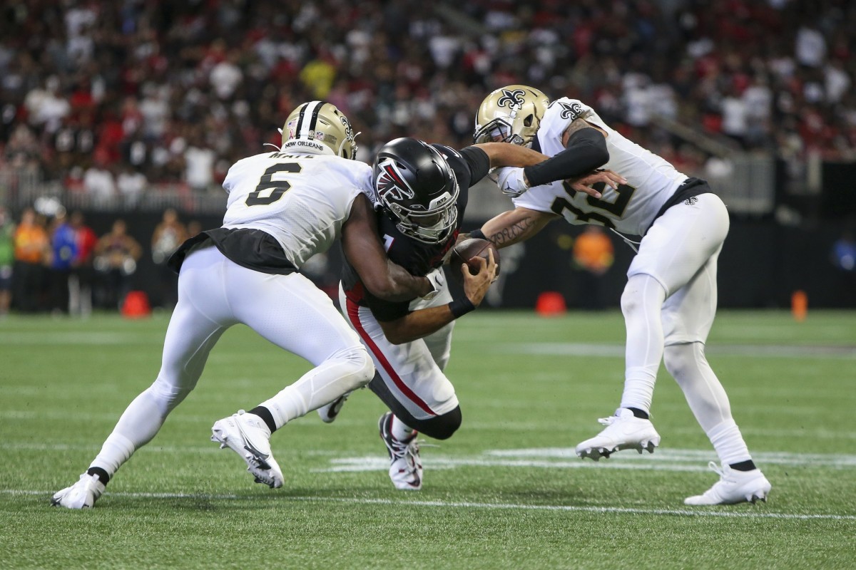 Sep 11, 2022; New Orleans Saints safety Marcus Maye (6) strips the ball from Atlanta quarterback Marcus Mariota (1) as safety Tyrann Mathieu (32) looks to make a tackle. Mandatory Credit: Brett Davis-USA TODAY Sports