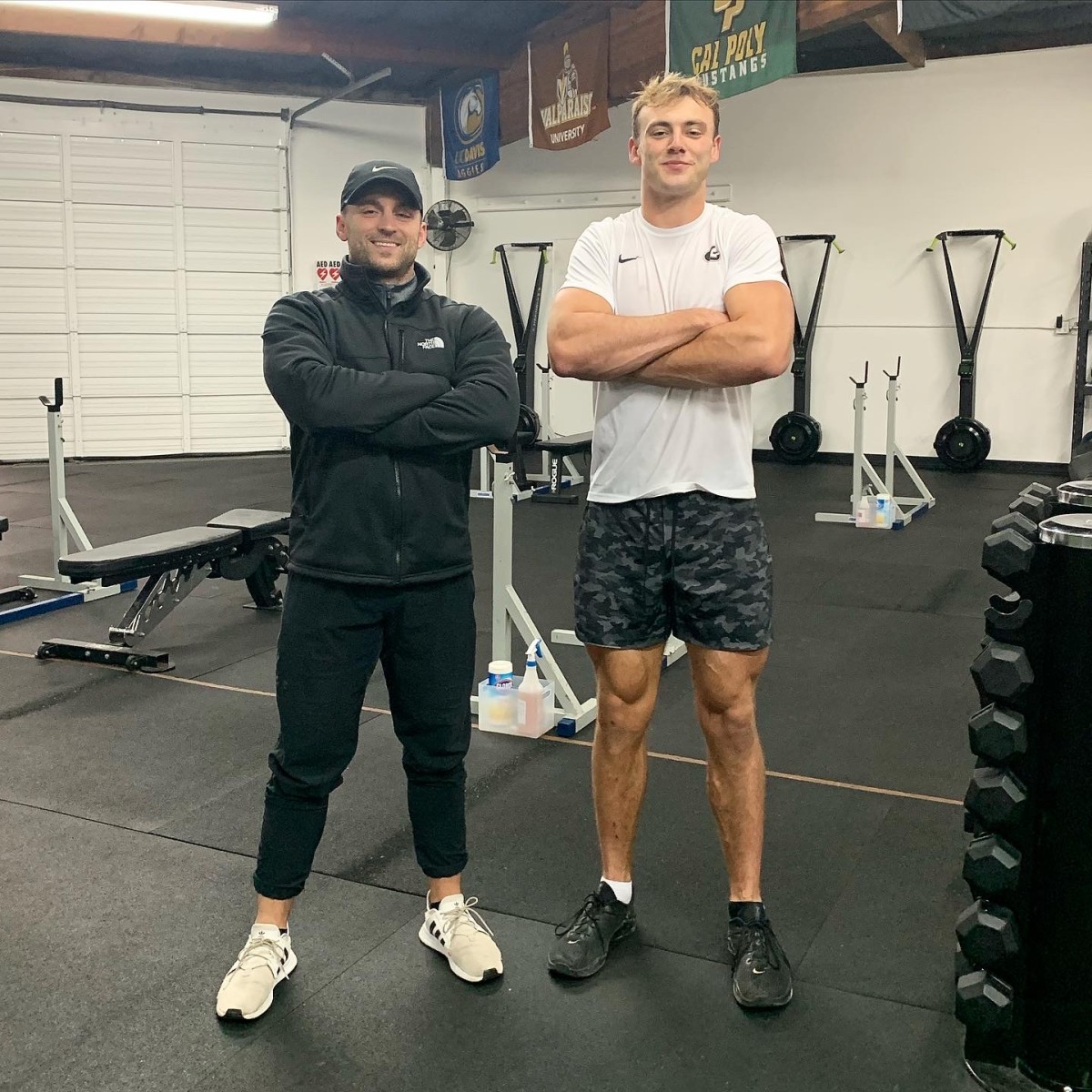 Brock Bowers with his personal trainer John Cortese.