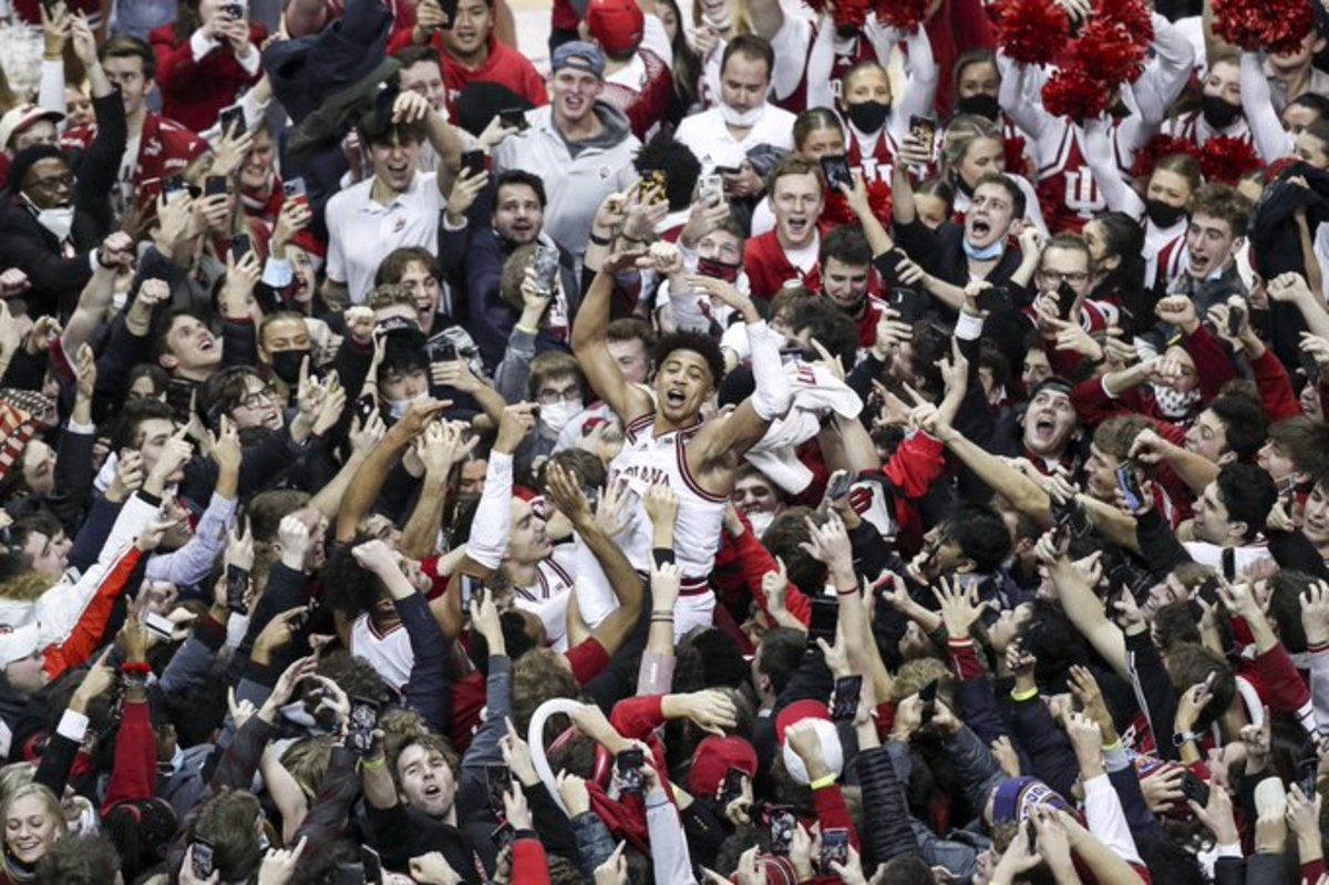 Indiana guard Rob Phinisee celebrates with fans on the court after the Hoosiers' 68-65 win over Purdue on Jan. 20, 2022 at Simon Skjodt Assembly Hall in Bloomington, Ind.