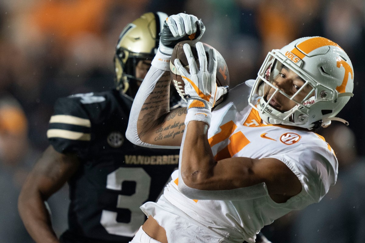 Tennessee wide receiver Jalin Hyatt (11) pulls in a first down catch Vanderbilt defensive back Ja'Dais Richard (34) during the first quarter at FirstBank Stadium Saturday, Nov. 26, 2022, in Nashville, Tenn.