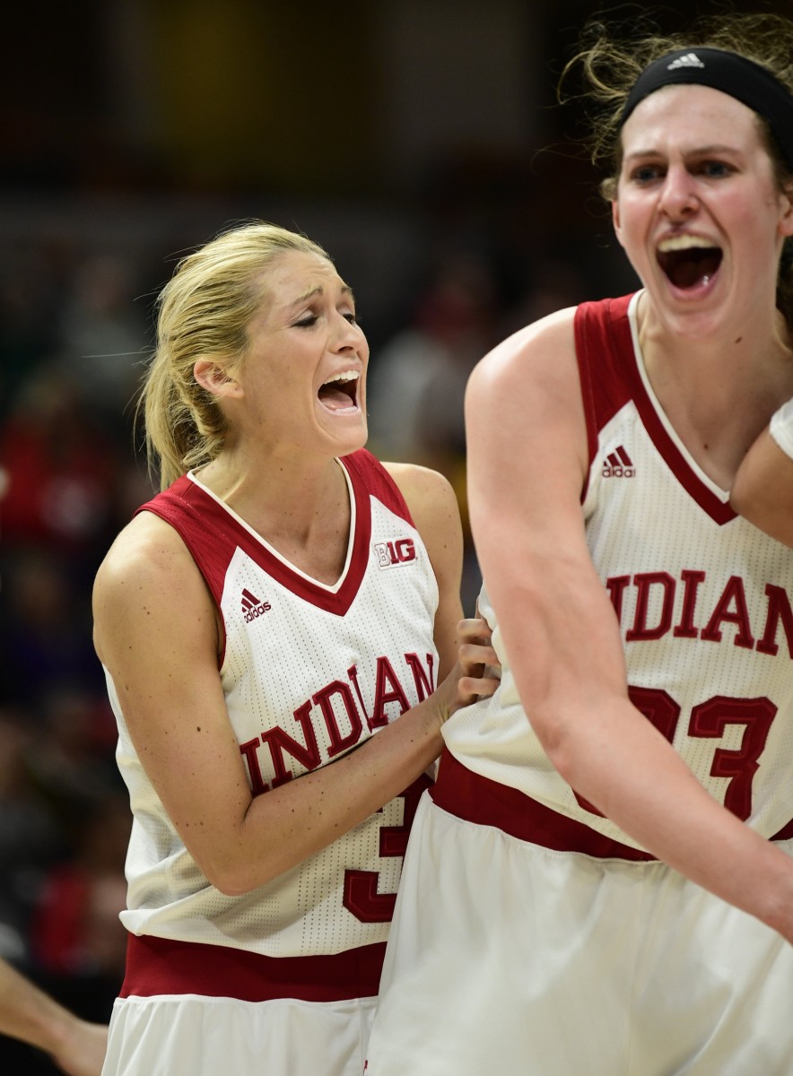 Mar 1, 2018; Indianapolis, IN, USA; Indiana Hoosiers guard Tyra Buss (3) and Indiana Hoosiers forward Amanda Cahill (33) react to a call in the third overtime during the second round of the Big Ten Conference Tournament at Bankers Life Fieldhouse. Indiana defeated Michigan State 111-109 after four overtime periods.