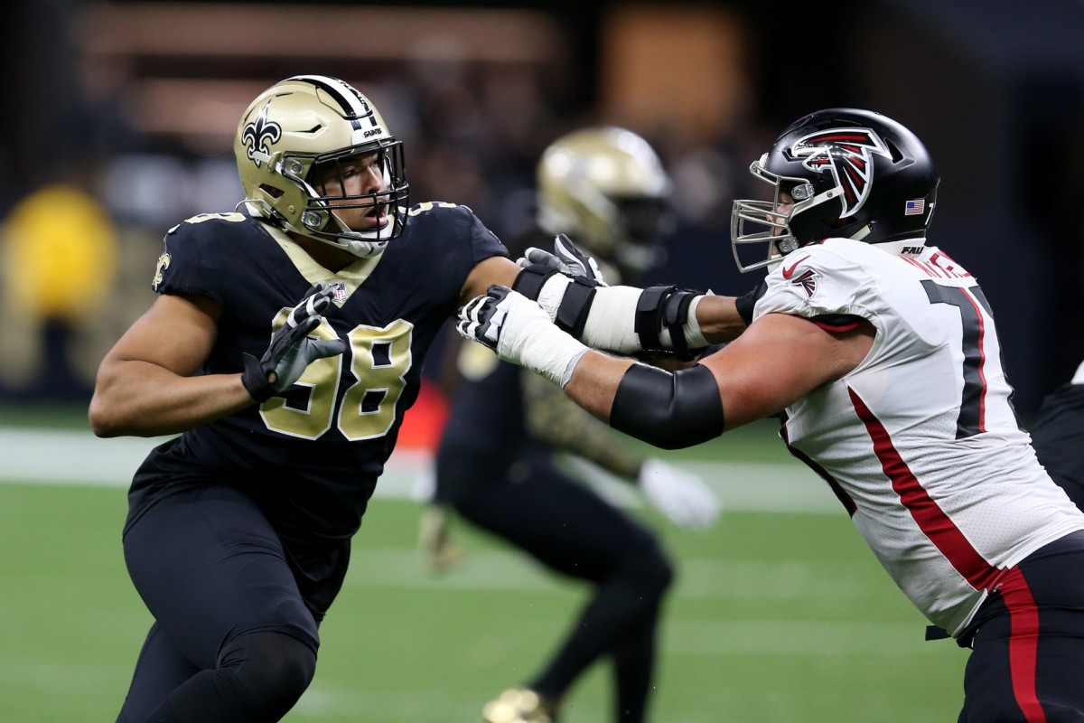 Nov 7, 2021; New Orleans Saints defensive end Payton Turner (98) takes on Atlanta Falcons offensive tackle Jake Matthews (70). Mandatory Credit: Chuck Cook-USA TODAY