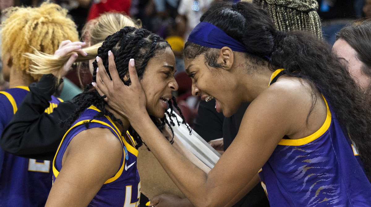 LSU’s Angel Reese hugs teammate Alexis Morris after defeating Utah in the Sweet 16 of the NCAA women’s tournament.