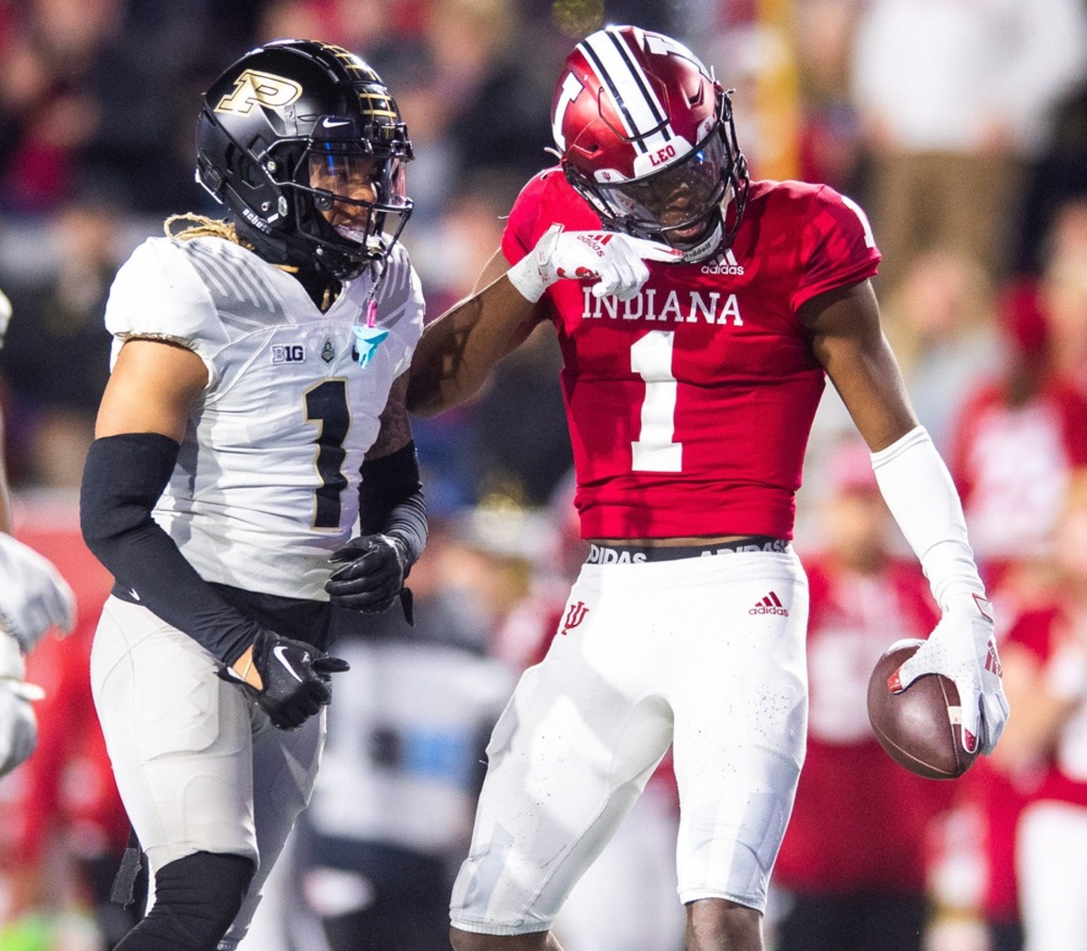 Indiana's Donaven McCulley (1) celebrates a first down during the second half of the Indiana versus Purdue football game at Memorial Stadium on Saturday, Nov. 26, 2022.