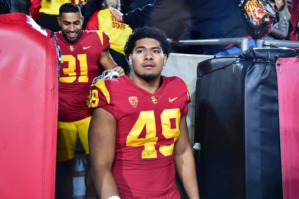 Nov 11, 2022; Los Angeles, California, USA; Southern California Trojans defensive lineman Tuli Tuipulotu (49) following the victory against the Colorado Buffaloes at the Los Angeles Memorial Coliseum. Mandatory Credit: Gary A. Vasquez-USA TODAY Sports