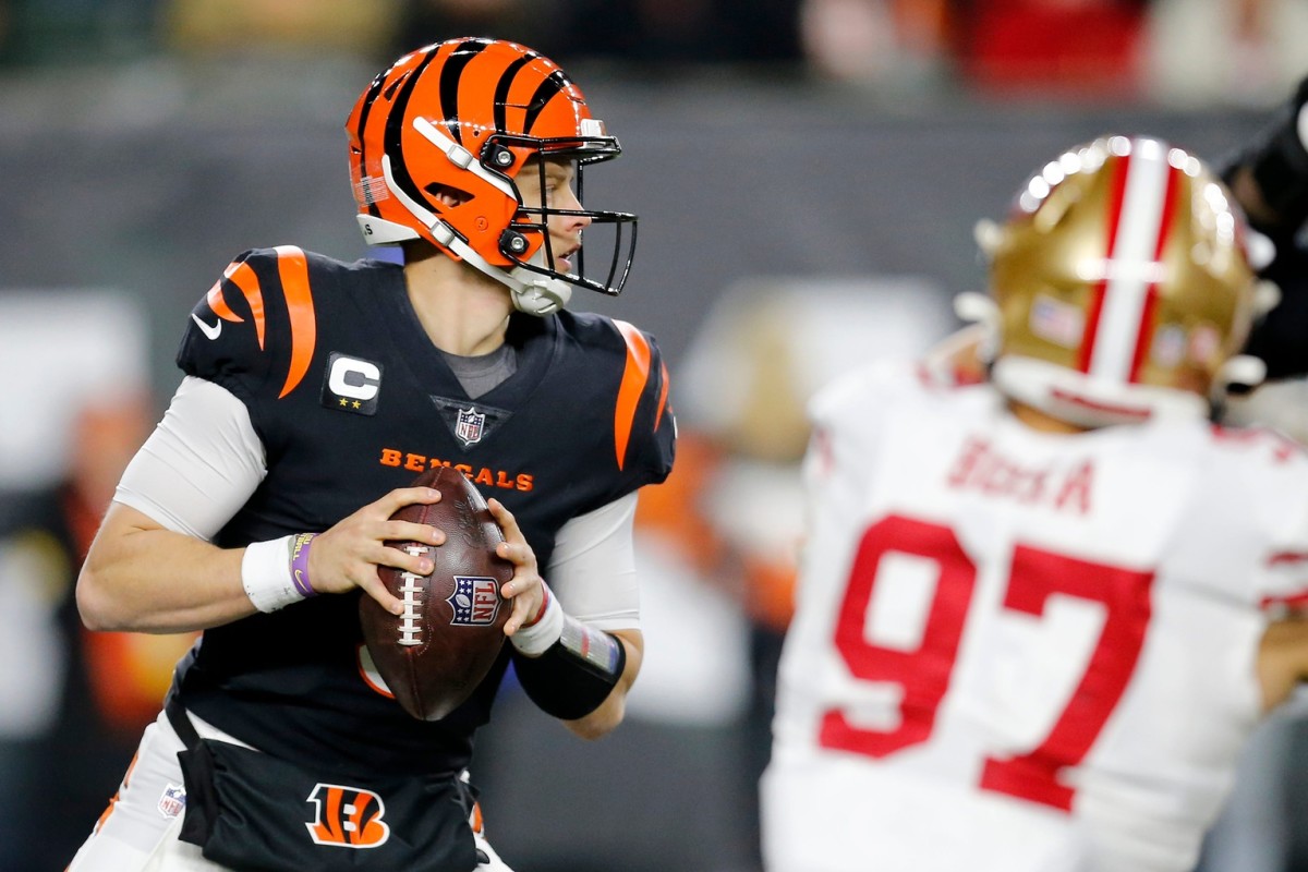 Cincinnati Bengals quarterback Joe Burrow (9) drops back to throw in overtime of the NFL Week 14 game between the Cincinnati Bengals and the San Francisco 49ers at Paul Brown Stadium in downtown Cincinnati on Sunday, Dec. 12, 2021. The Bengals tied the game in the fourth quarter, but eventually fell to the 49ers in overtime, 26-23. San Francisco 49ers At Cincinnati Bengals