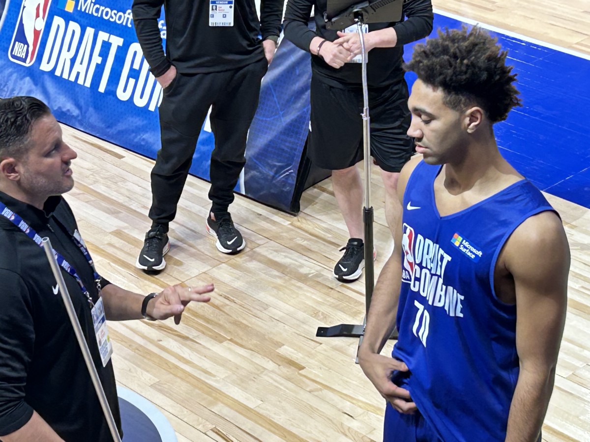 Trayce Jackson-Davis gets instructions before a vertical leap test during the NBA Draft Combine on Monday in Chicago. (HoosiersNow.com photo by Tom Brew)