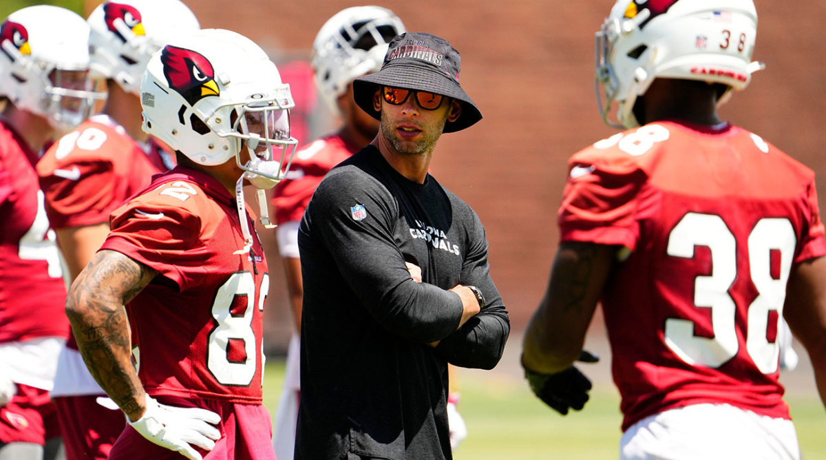 Jonathan Gannon wearing a bucket hat at his first Cardinals OTAs.