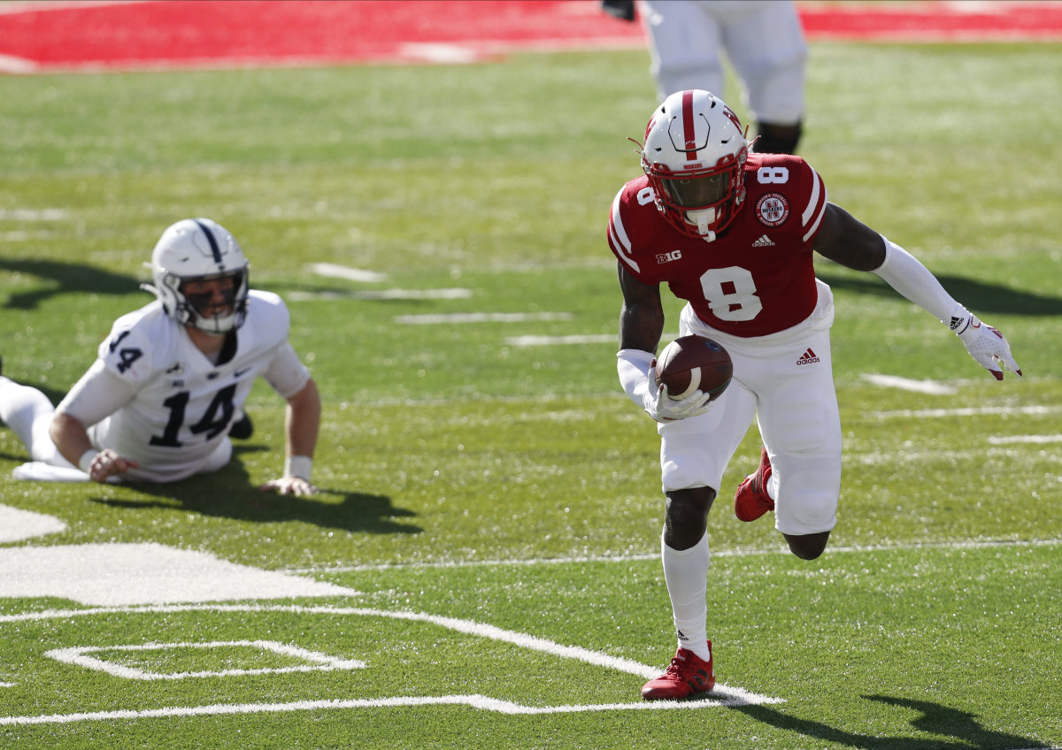Safety Deontai Williams runs 26 yards for a touchdown after knocking the ball loose from Penn State quarterback Sean Clifford on a second-quarter sack.