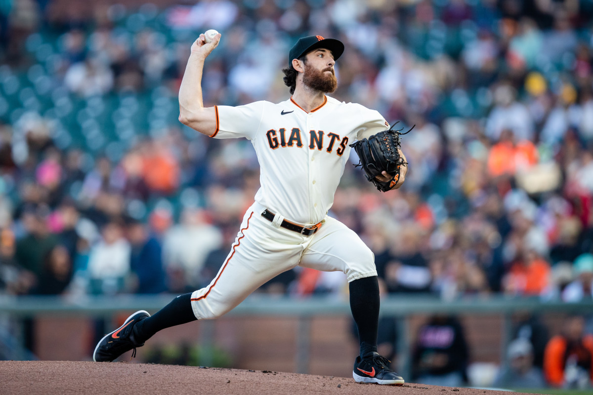 SF Giants pitcher Ryan Walker throws against the San Diego Padres during the first inning at Oracle Park on June 19, 2023.