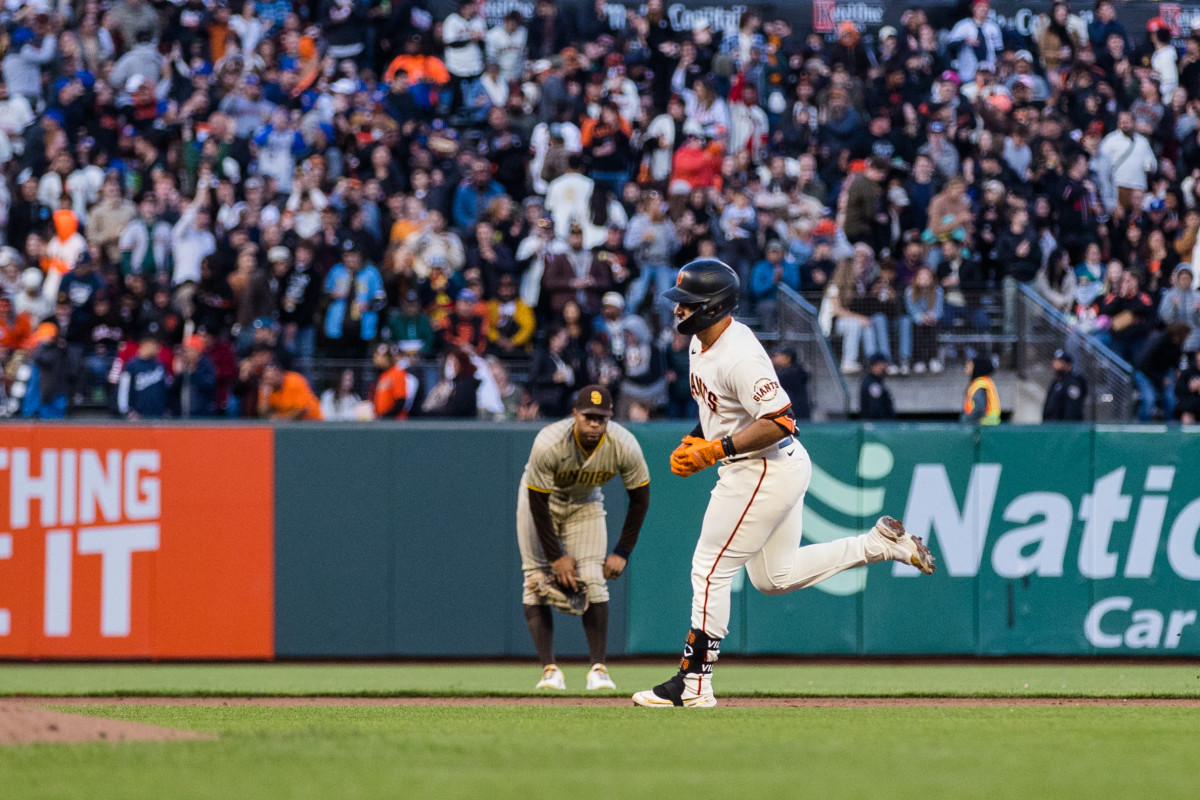 SF Giants third baseman David Villar runs the bases after hitting a solo home run against the San Diego Padres on June 19, 2023.