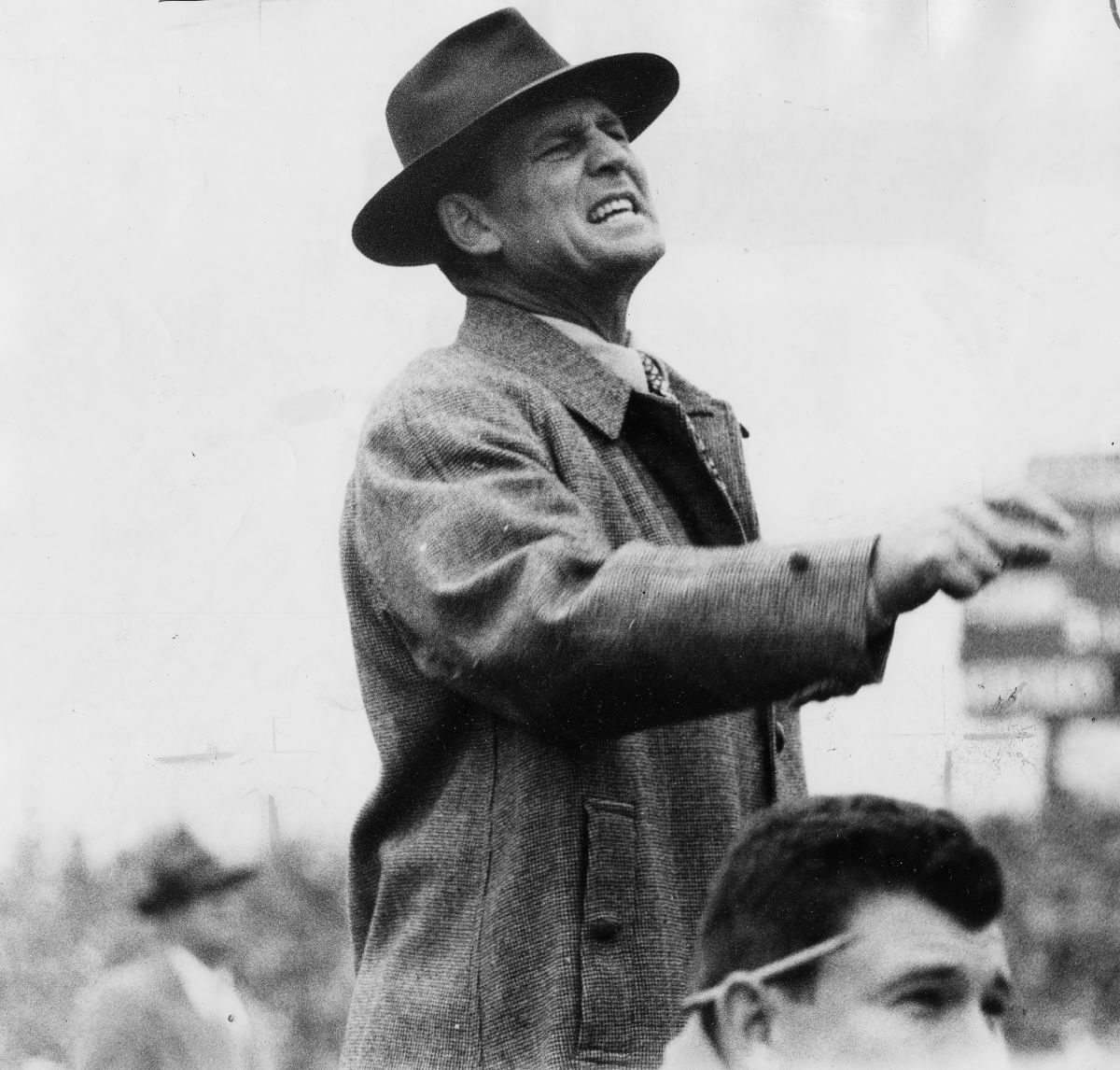 Paul W. "Bear" Bryant as the head coach at Kentucky