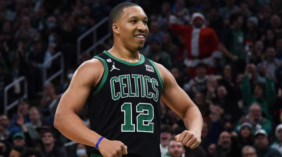 Celtics forward Grant Williams reacts after a basket during the first half against the Minnesota Timberwolves.