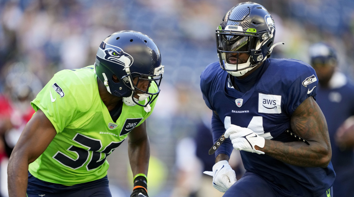 Seahawks cornerback Michael Jackson, left, defends against wide receiver DK Metcalf.