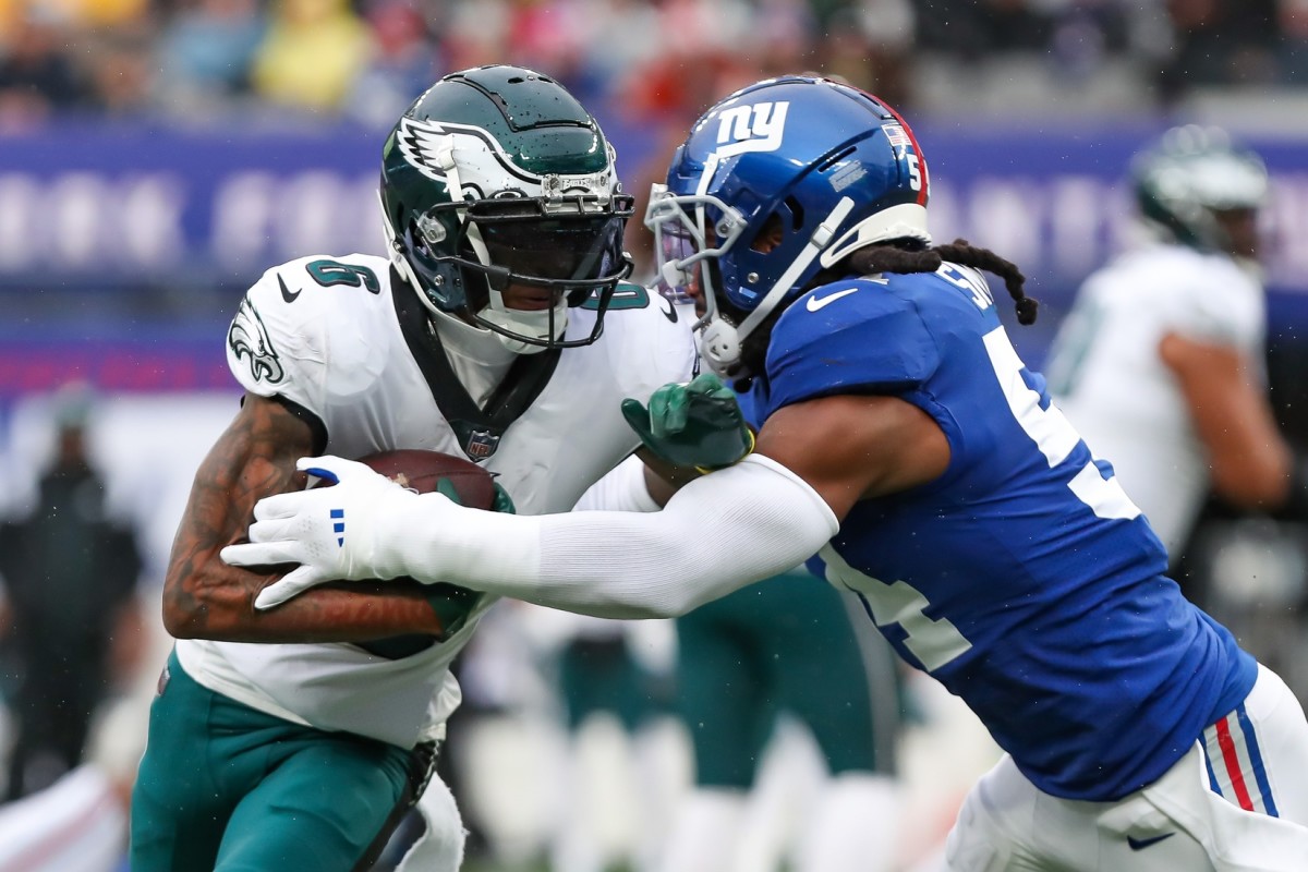 Philadelphia Eagles wide receiver DeVonta Smith (6) is tackled by New York Giants linebacker Jaylon Smith (54). Mandatory Credit: Tom Horak-USA TODAY Sports