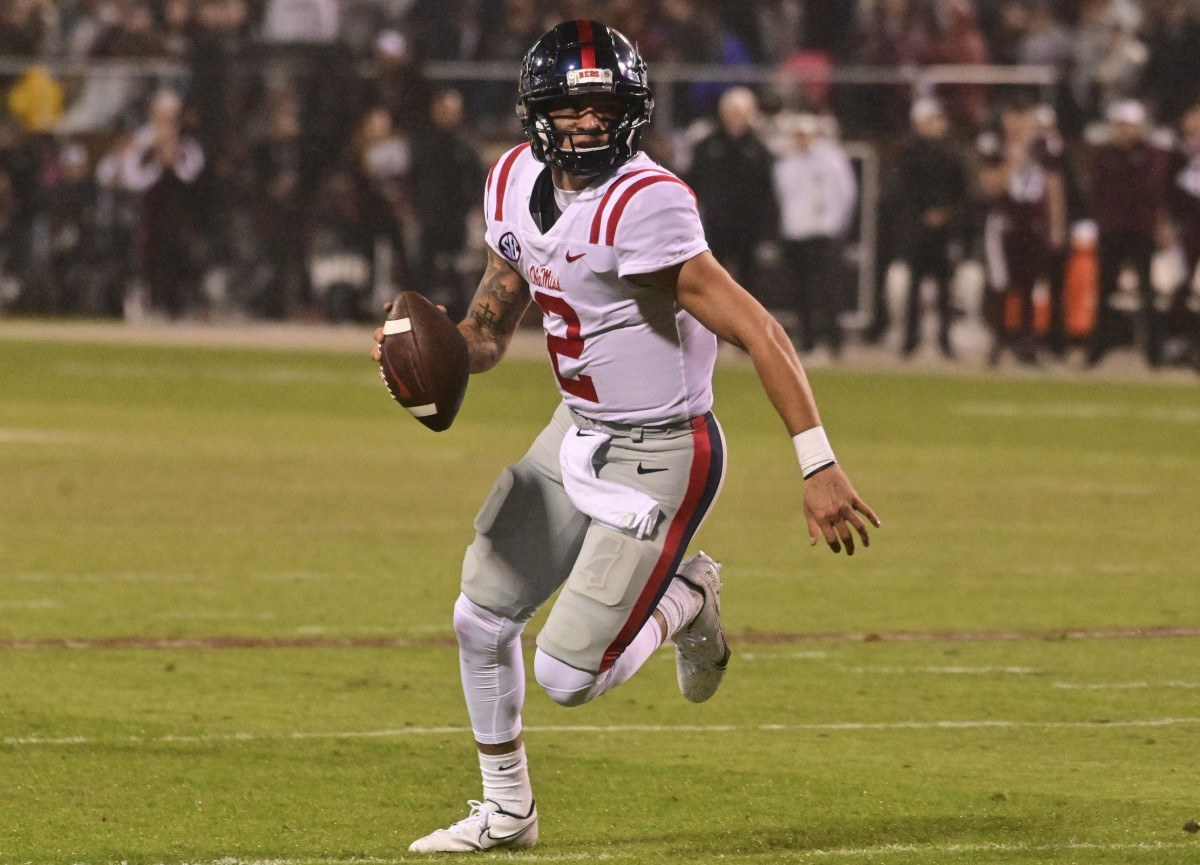 Nov 25, 2021; Mississippi Rebels quarterback Matt Corral (2) runs the ball against the Mississippi State Bulldogs. Mandatory Credit: Matt Bush-USA TODAY Sports