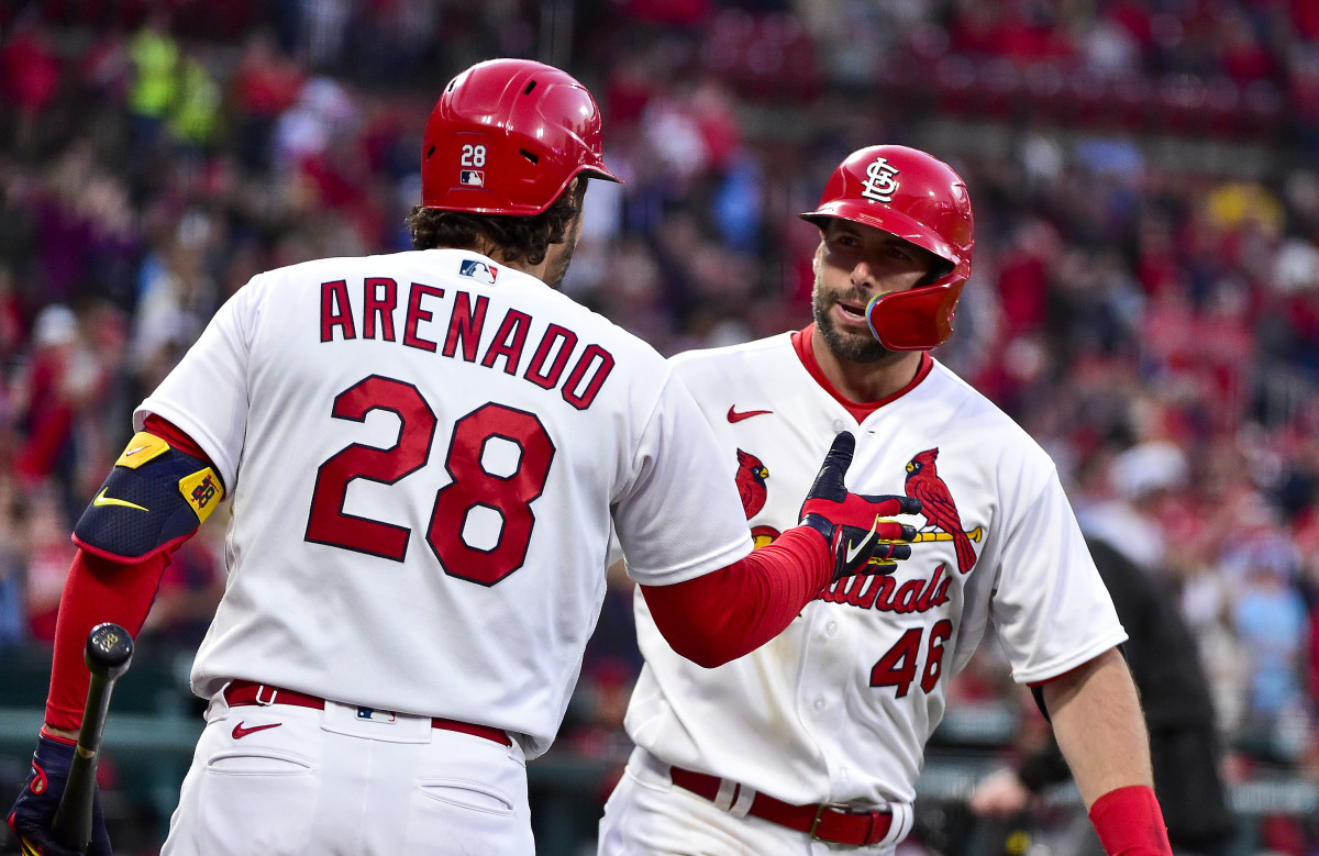 Nolan Arenado high-fives Paul Goldschmidt following his home run against the Arizona Diamondbacks.
