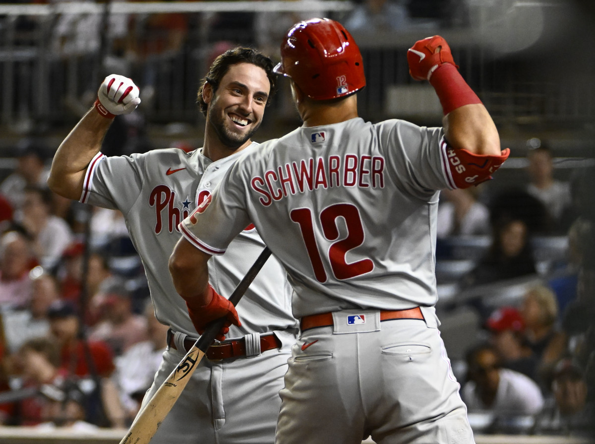 Kyle Schwarber and Matt Vierling celebrate after Vierling hit a home run against the Washington Nationals.