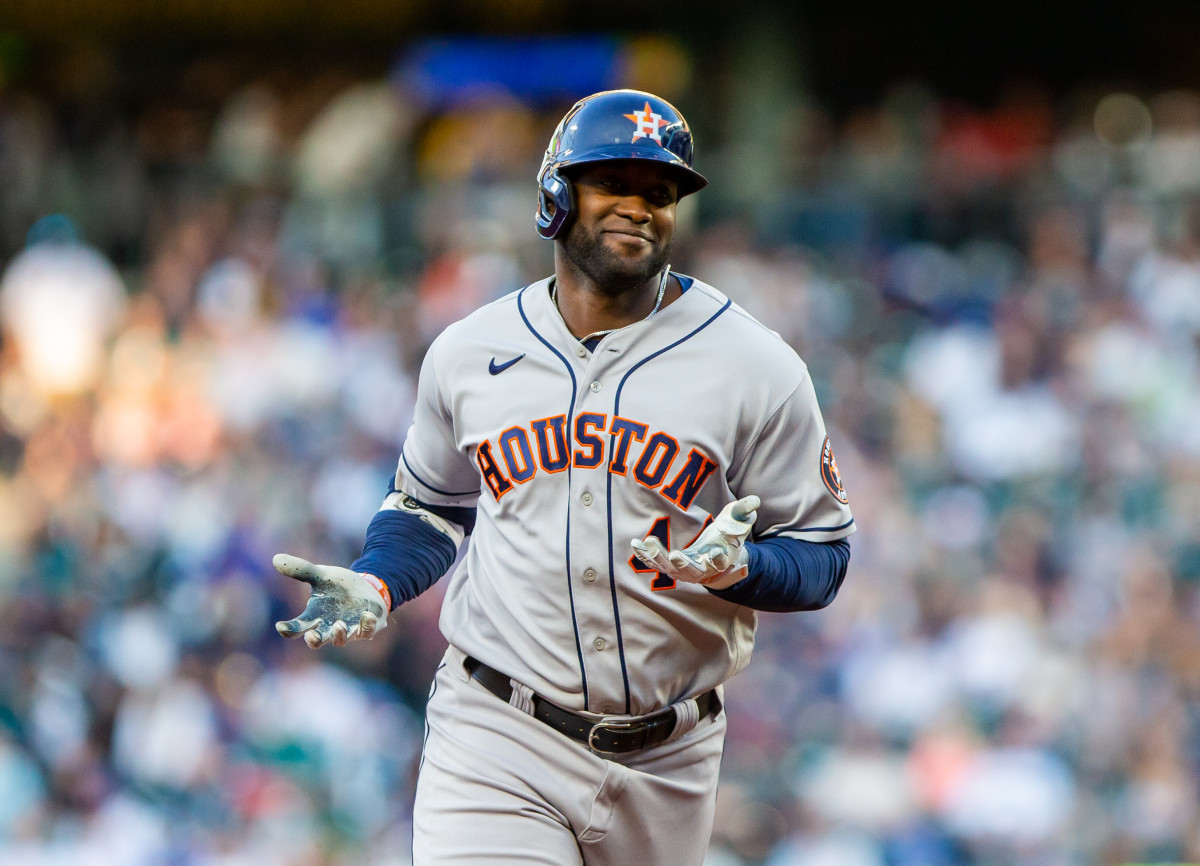 Yordan Álvarez rounds the bases after hitting a home run against the Seattle Mariners.