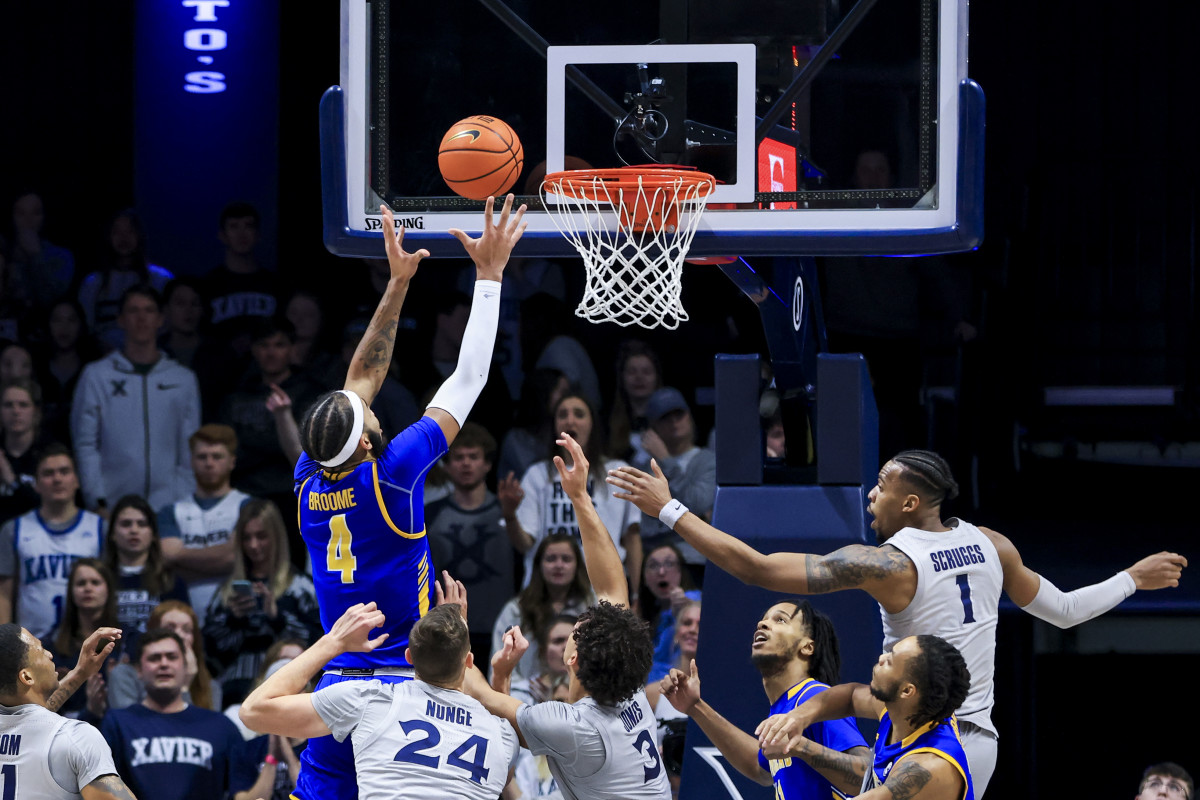 Dec 15, 2021; Cincinnati, Ohio, USA; Morehead State Eagles forward Johni Broome (4) drives to the basket against the Xavier Musketeers in the second half at the Cintas Center. Mandatory Credit: Aaron Doster-USA TODAY Sports