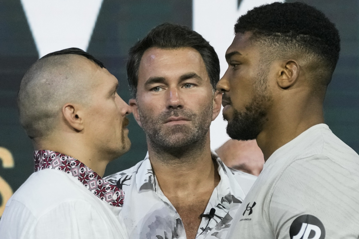 Heavyweight boxers Britain’s Anthony Joshua (right) and Ukraine’s Oleksandr Usyk face off during a weigh-in at King Abdullah Sports City.