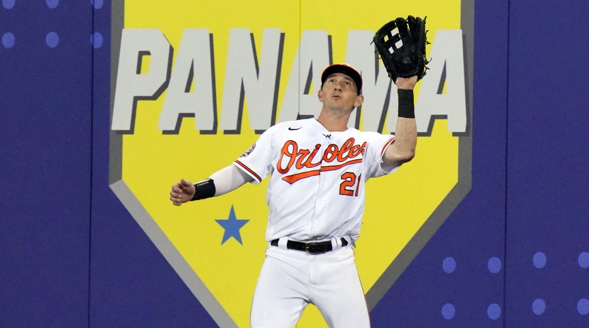 Austin Hays makes the catch on a fly ball hit by Boston Red Sox’s Alex Verdugo while wearing a microphone and talking with the ESPN broadcasters during the third inning of the MLB Little League Classic baseball game in Williamsport, Pa., Sunday, Aug. 21, 2022.