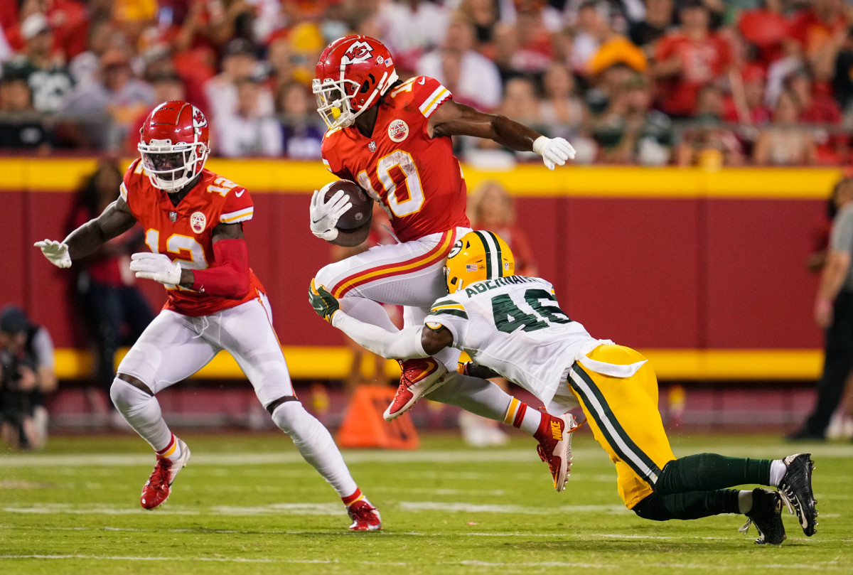Aug 25, 2022; Kansas City, Missouri, USA; Kansas City Chiefs running back Isiah Pacheco (10) is tackled by Green Bay Packers safety Micah Abernathy (46) as Kansas City Chiefs wide receiver Josh Gordon (12) looks to block during the second half at GEHA Field at Arrowhead Stadium. Mandatory Credit: Jay Biggerstaff-USA TODAY Sports